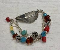Eagle Feather Bracelet: Turquoise, Amber, Coral, and Sterling Silver by Artisan Jewelry